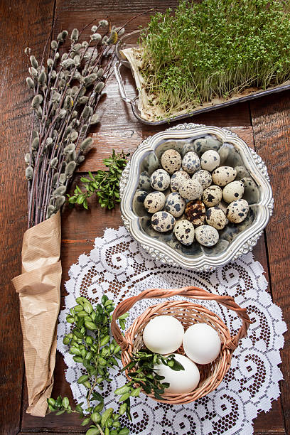 istock Easter composition of catkins, eggs and cress on wooden table 469819252