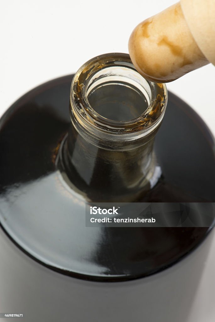 vinegar bottle balsamic vinegar bottle isolated on white Aging Process Stock Photo