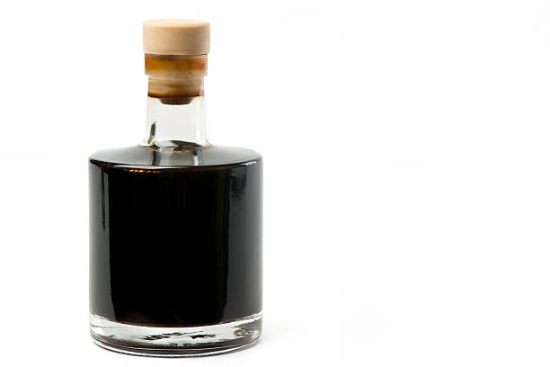 vinegar bottle balsamic vinegar bottle isolated on white balsamic vinegar stock pictures, royalty-free photos & images