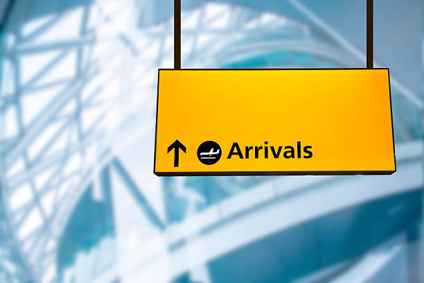 Check in, Airport Departure & Arrival information board signCheck in, Airport Departure & Arrival information board sign taken in 2015.