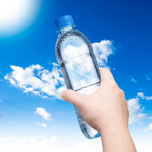 istock Hand holding bottle of Water 469820419