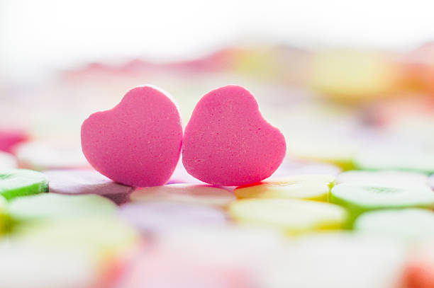 Closeup of heart candies with message