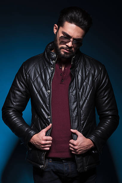 istock young fashion unshaved man is looking sad 469821181