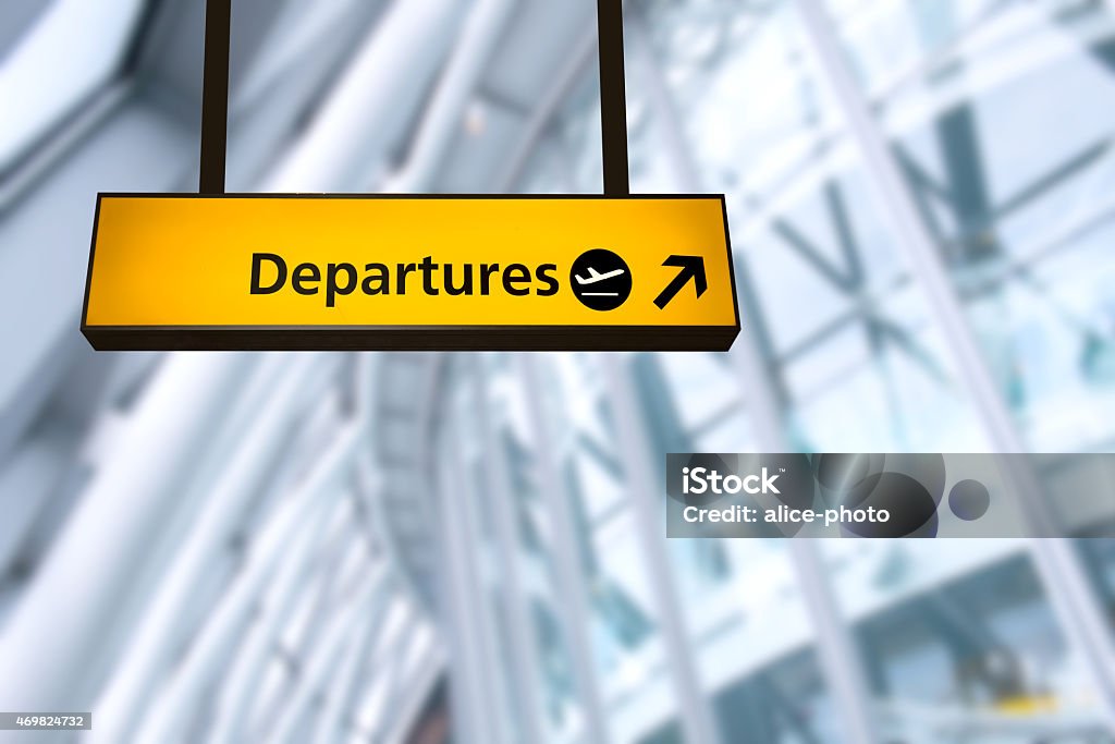 Check in, Airport Departure & Arrival information board sign Check in, Airport Departure & Arrival information board sign taken in 2015. Airport Stock Photo