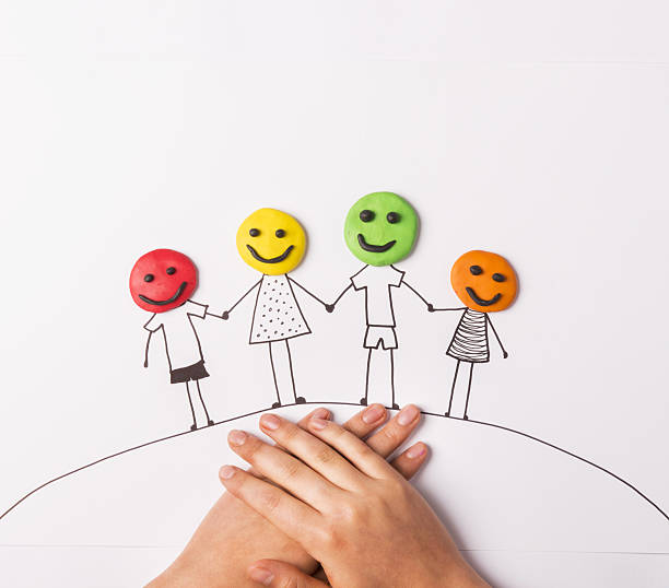 istock A concept of family with line figures and colored faces 469825857