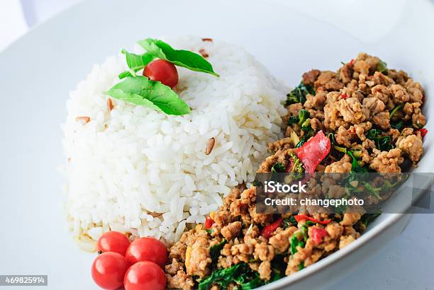 Rice Topped With Stirfried Pork And Basil Stock Photo - Download Image Now - 2015, Adulation, Asia