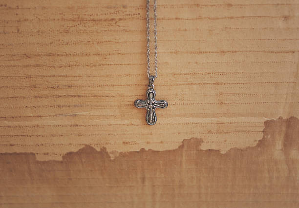 istock ornate cross on stained background 469826684