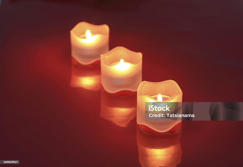 Closeup Of Valentine Candles Isolated On Red Background Stock
