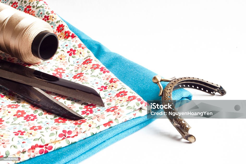 Clothes and sewing tools Clothes and sewing tools on white background 2015 Stock Photo