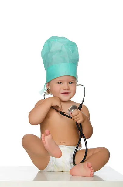 Photo of smiling child with stethoscope