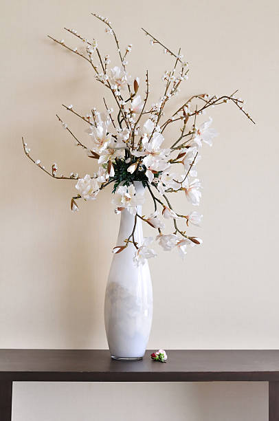 istock Flower in white vase on the table 469840643