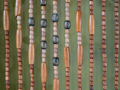 Ethnic wood beads curtain closeup