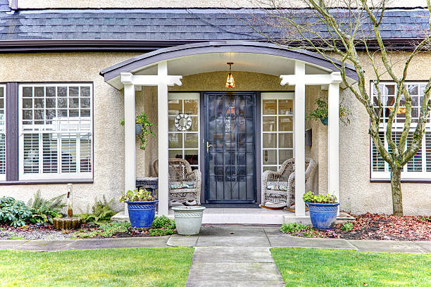 istock American small town cute house exterior. 469844843