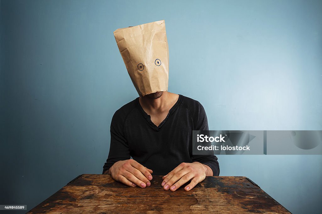 Stupid man with bag over his head Adult Stock Photo