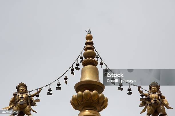 Religious Gold Symbol On Top Of A Temple Stock Photo - Download Image Now - Ancient, Asia, Bell