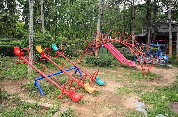 istock Old children playground in the park 469845816