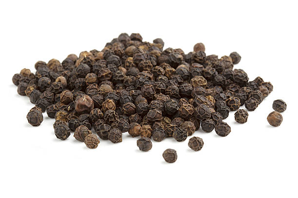 istock heap of black peppercorns 469845879