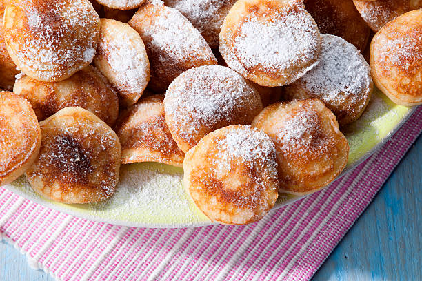 istock Overhead view of poffertjes with powdered sugar 469858225