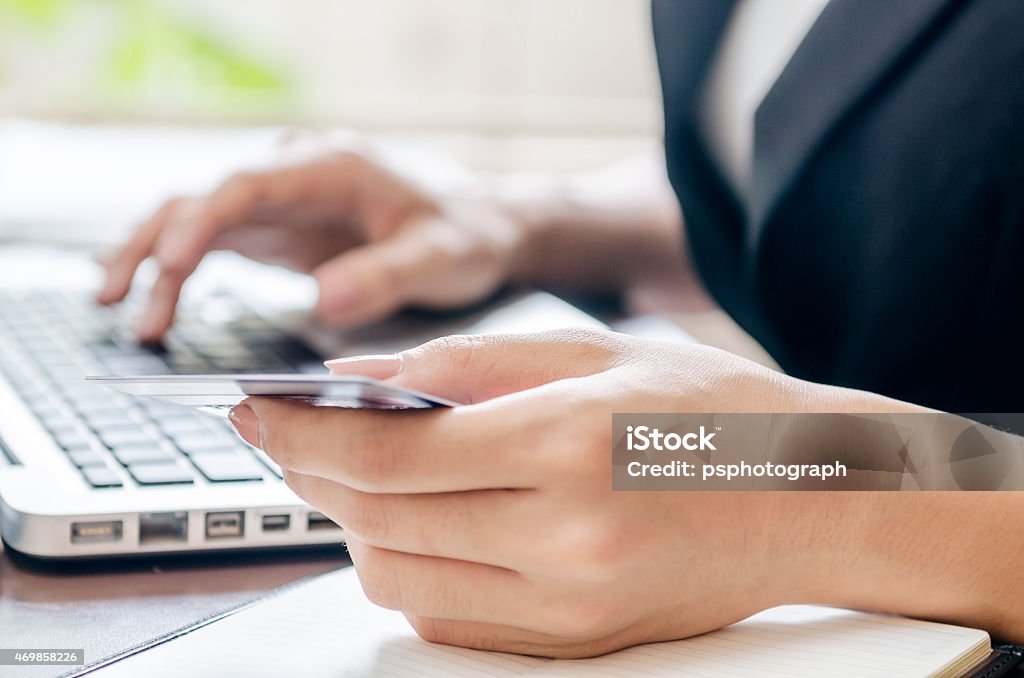 woman working woman typing document in an office 2015 Stock Photo