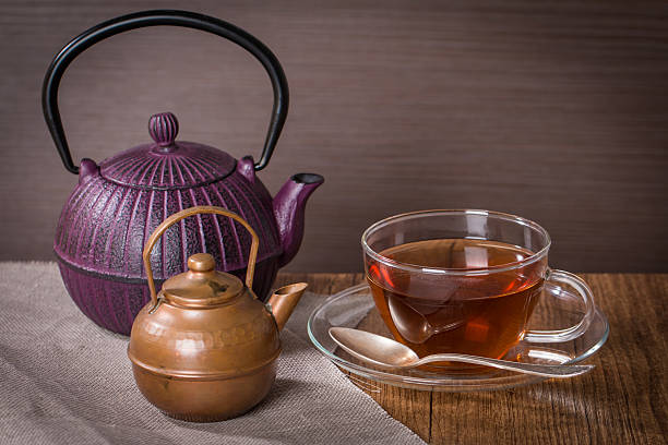 istock Cup of tea and a vintage teapot 469861304