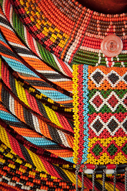 African Beaded Necklace. Detail of a beaded necklace worn by a tribal woman from Kenya. african tribe stock pictures, royalty-free photos & images