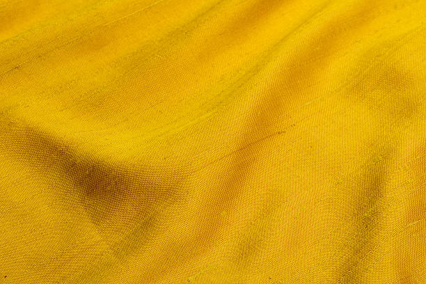 istock drape of yellow shantung 469865555