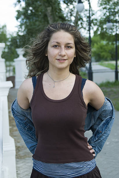 istock Girl in city park 469867341