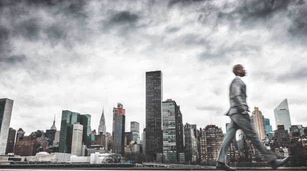 istock busy business walking fast on new york 469868493