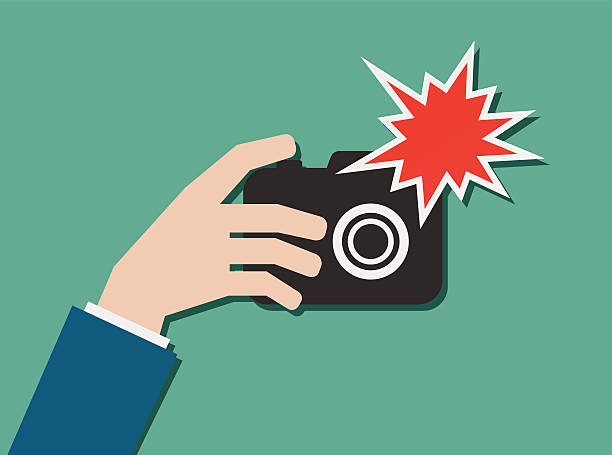 hand with photo camera and flash icon hand with photo camera and flash icon design camera flash photos stock illustrations