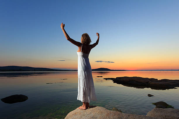 istock Woman on the beach 469868535