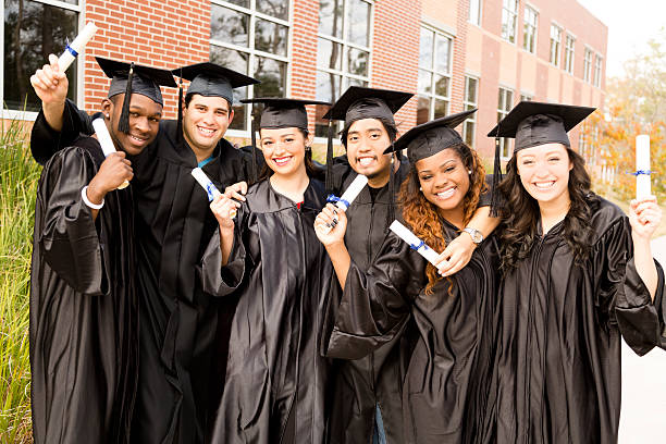 istock Education: Multi-ethnic friends excited after college graduation. 469868815