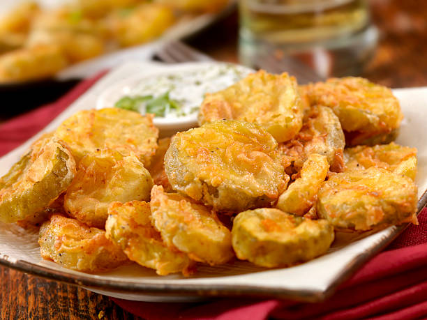 Southern Fried Pickles Southern Fried Pickles-Photographed on Hasselblad H3D2-39mb Camera dill pickle stock pictures, royalty-free photos & images