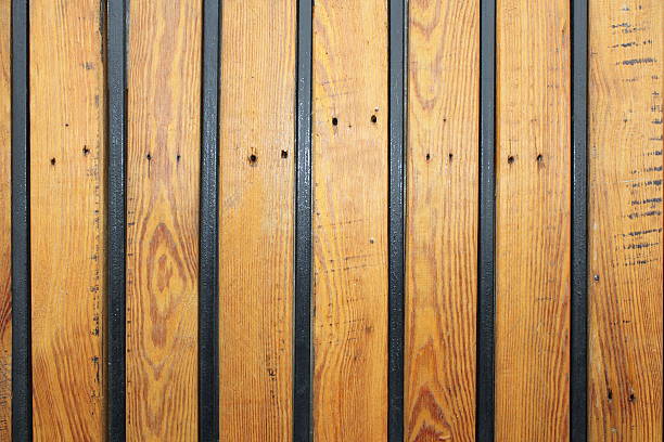 istock wooden texture with metal bars 469869284