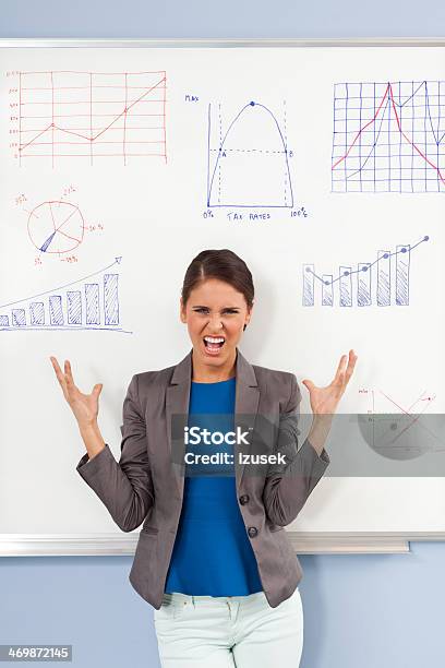 Frustrated Female Teacher Stock Photo - Download Image Now - Furious, Mathematical Symbol, Mathematics