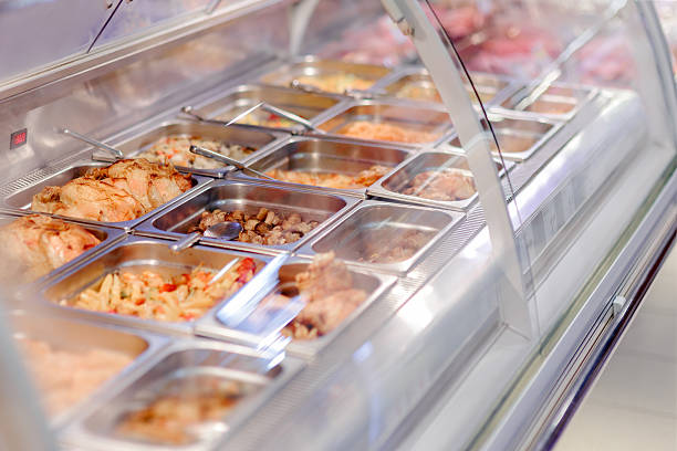 istock Cafeteria take-out food in showcase window 469872292