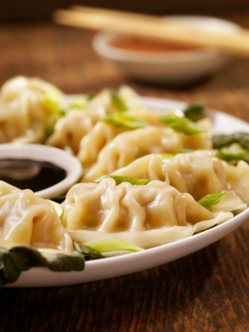 Steamed Dumplings with fresh green onions and soya sauce -Photographed on Hasselblad H1-22mb Camera