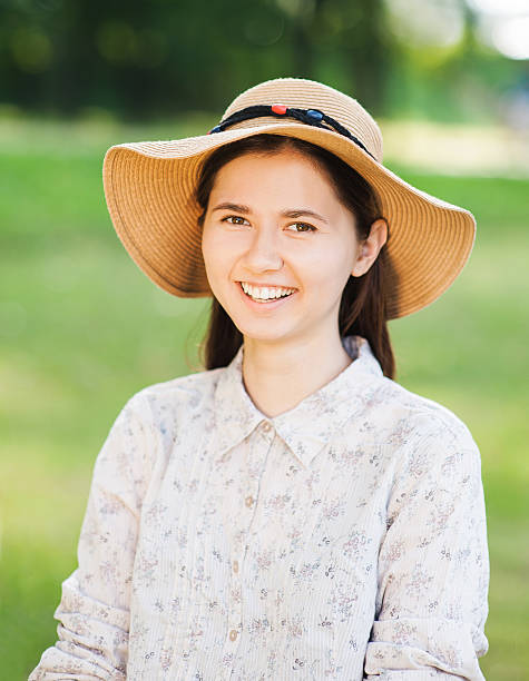 istock Smiling girl in a park 469872384