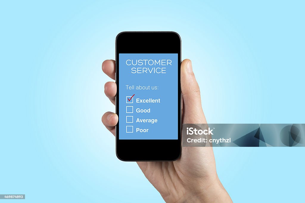 Hand Holding Smartphone with Customer Service Survey on a Screen Hand Holding Smartphone with Customer Service Survey Form on a Screen Questionnaire Stock Photo