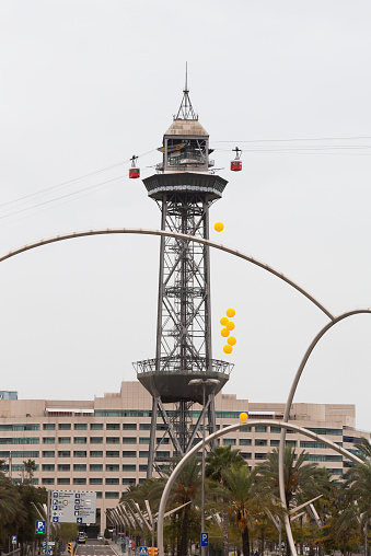 Barcelona, Spain – November 08, 2014: Symbolically launched yellow balloons, flying by \