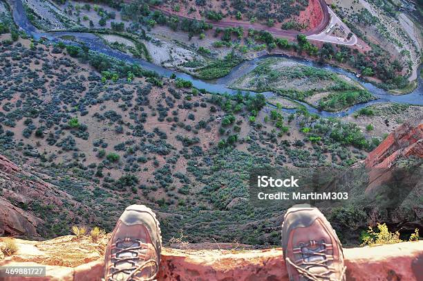 Mans Feet On The Edge Of Rock Cliff Stock Photo - Download Image Now - Cliff, Steep, Danger