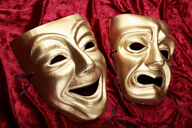 Tragicomedy Masks Tragicomedy masks on red fabric tragicomedy stock pictures, royalty-free photos & images