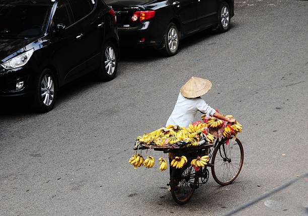 Saigon, Vietnam - October 23, 2011: Life of Vietnamese vendors at small market in Ho Chi Minh city (Saigon), Vietnam.