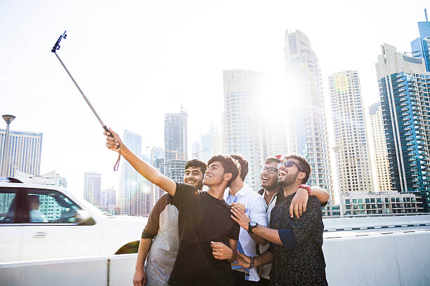 istock Friends taking a selfie in Dubai Marina during a vacation 469898116