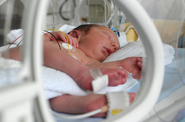 istock Newborn baby in incubator 469898454