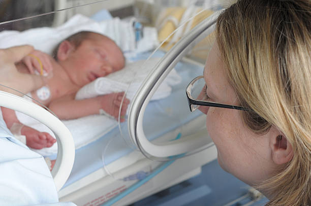 istock Newborn baby in incubator 469898458