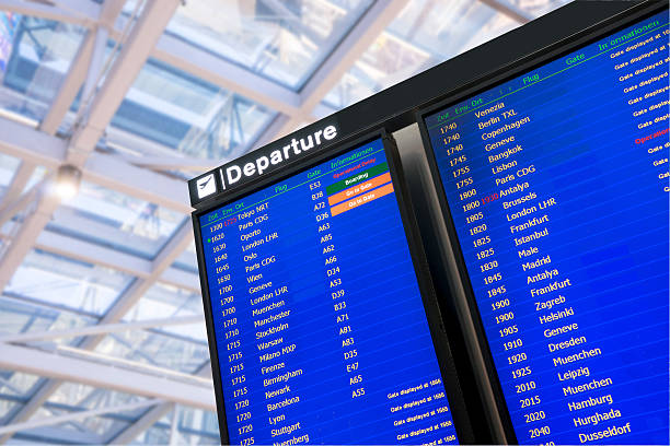 istock Check in, Airport Departure & Arrival information board sign 469899250