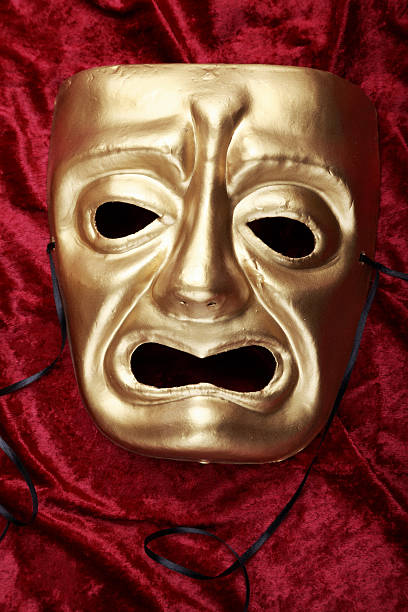 Tragedy Mask Tragedy mask on red velvet tragicomedy stock pictures, royalty-free photos & images