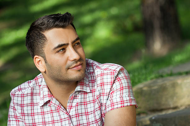 istock Gorgeous young attracive man in nature 469899786