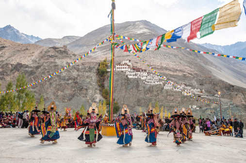 Diskit,Ladakh,India -October 14,2012:Traditional artists perform Cham dance(masked danc is some sects of Buddhists) during Diskit Festival at Diskit monastery in Diskit,Ladakh, India.
