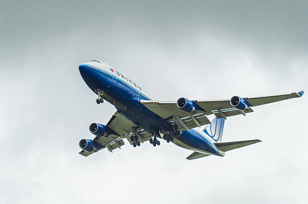 Melbourne, Australia - October 13, 2013: United Airlines Boeing 747 airliner landing at Melbourne Tullamarine Airport.